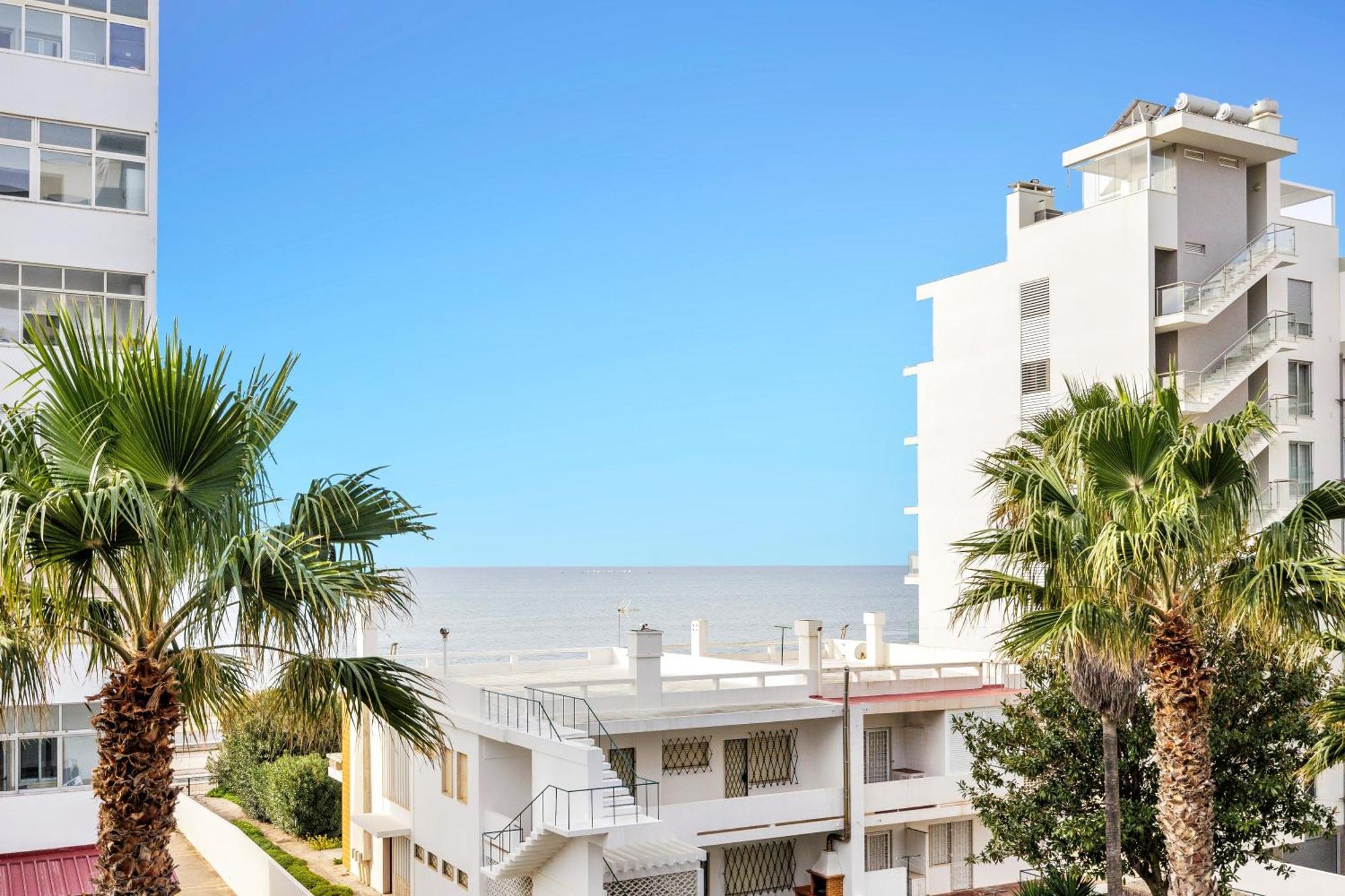 Stylish Modern Beachside Apartment With Pool & Seaview Quarteira Eksteriør billede